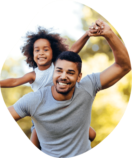 Father having fun with his daughter both smiling